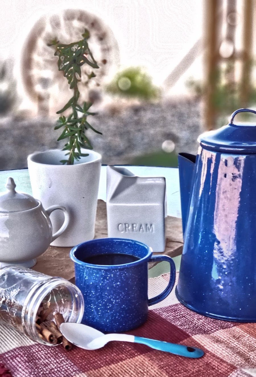 blue enamel coffee pot over an open fire, cowboy style, Alpine